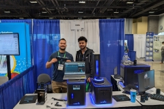 Nason-in-booth-with-visitor